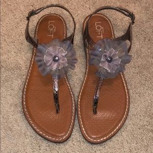 Size 8 sandals with silver bow detail